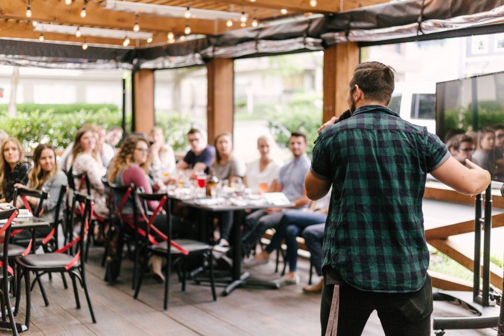 Person speaking to audience