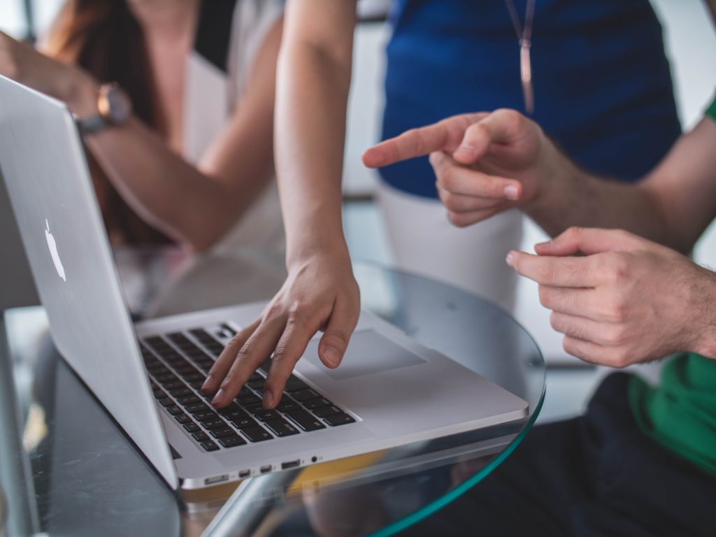 Meeting around a laptop